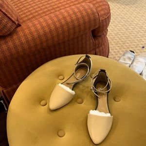 Women’s Fall flats, two-toned with silver strap and silver-lined outer heel.